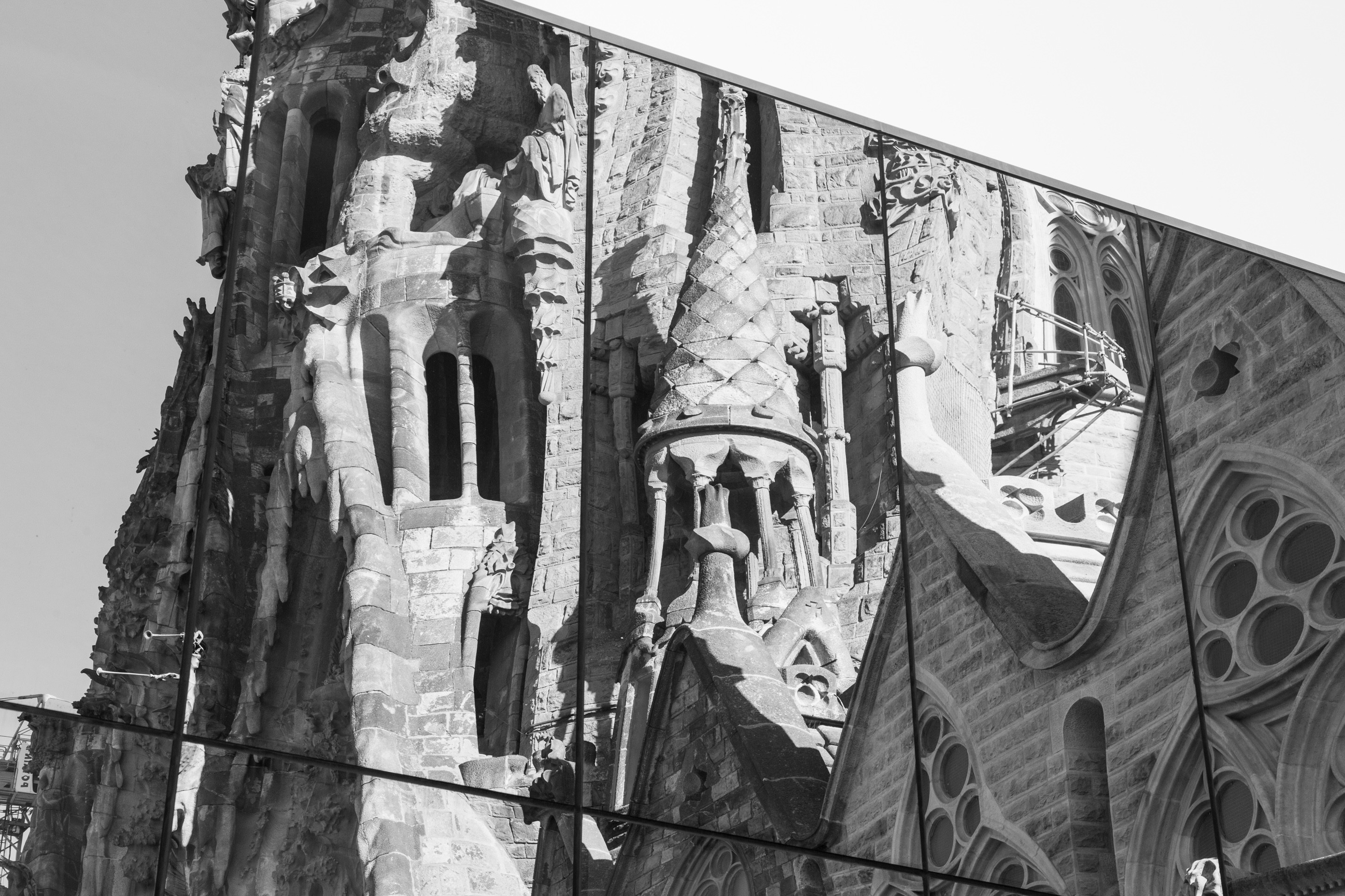 La Sagrada Familia reflected in an array of tall mirrors.
