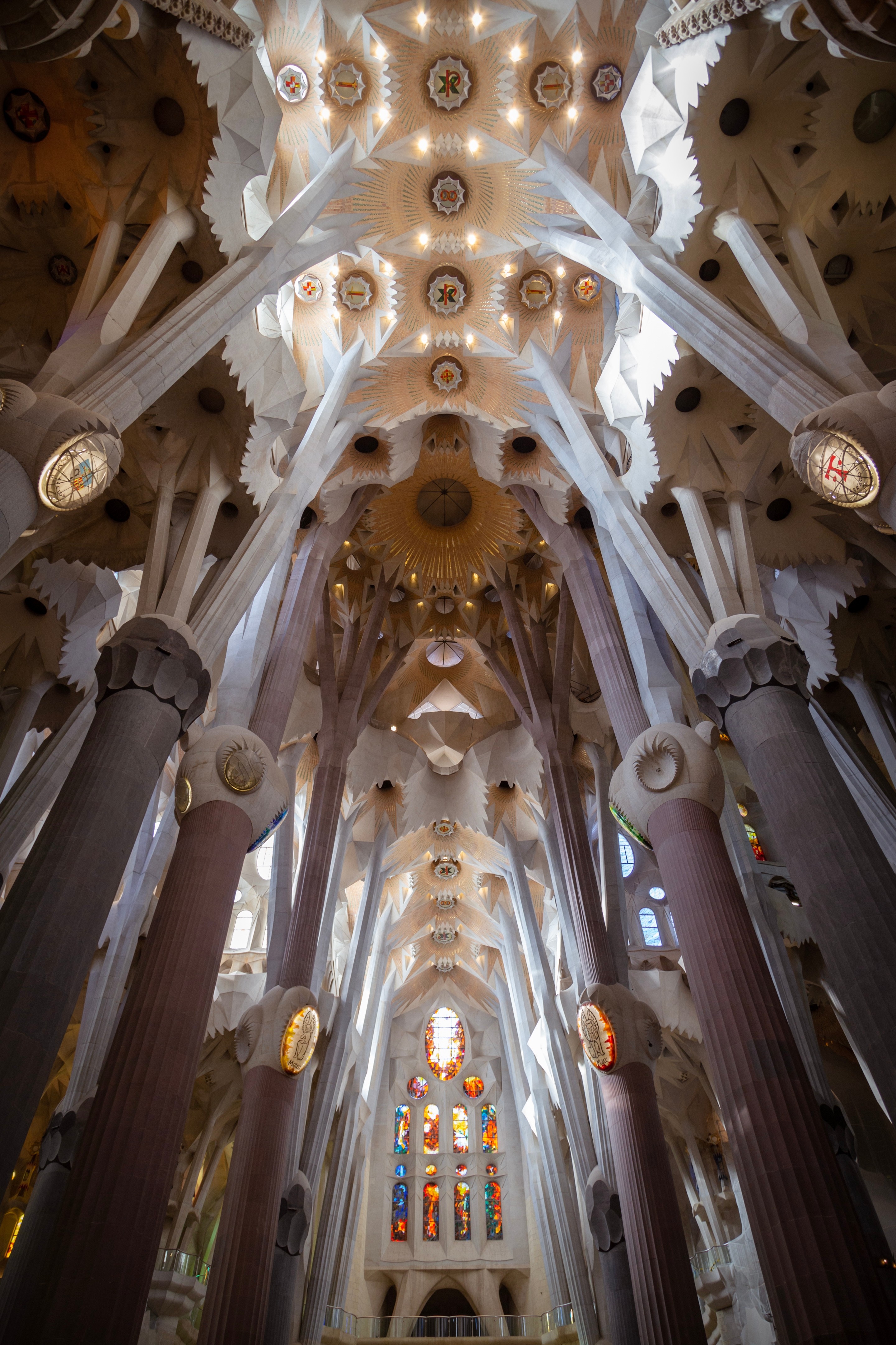 Showing the interior roof and huge columns rising up to meet it. La Sagrada Familia.