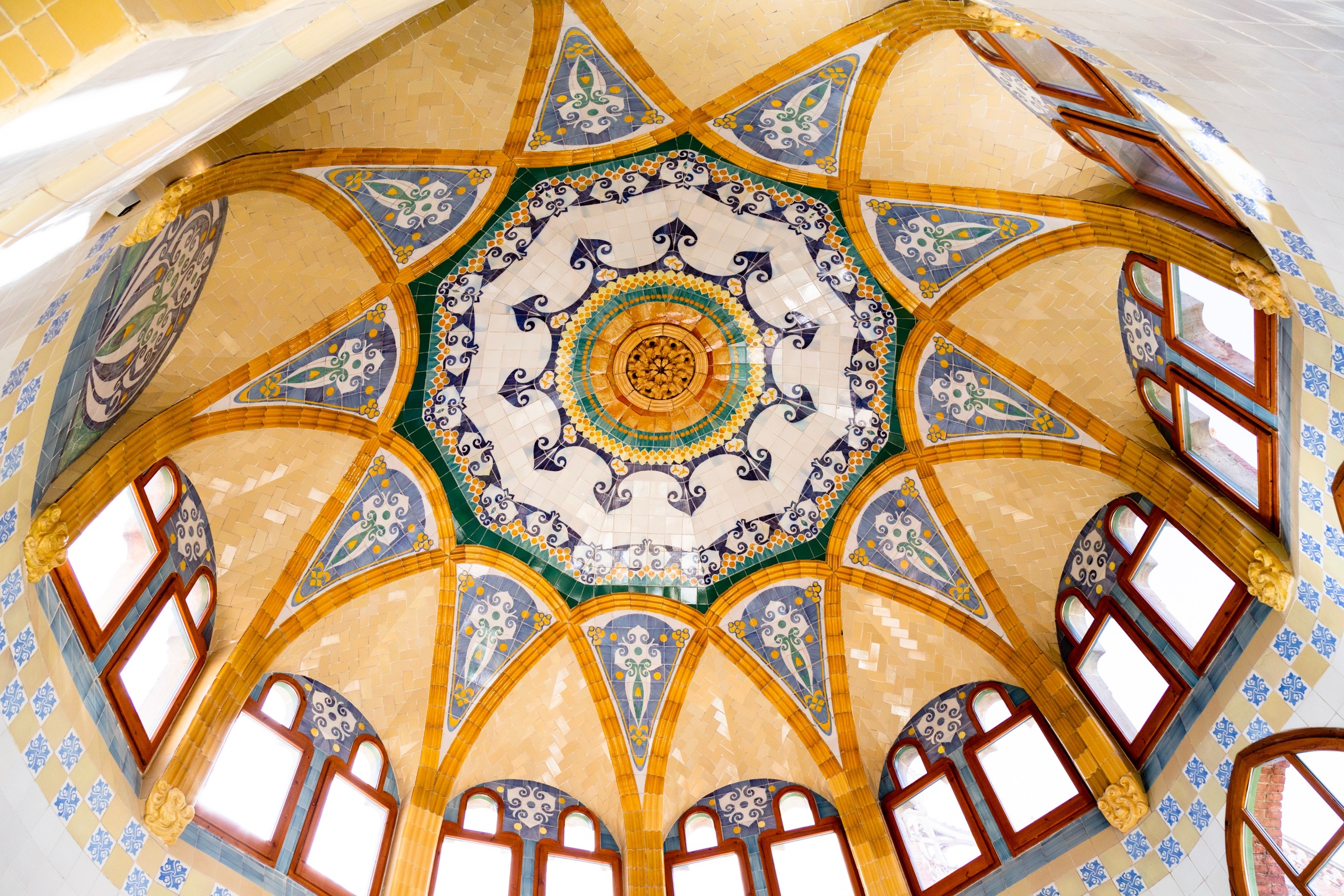 Intricate tiled dome ceiling at The Hospital de la Santa Creu i Sant Pau, Barcelona.