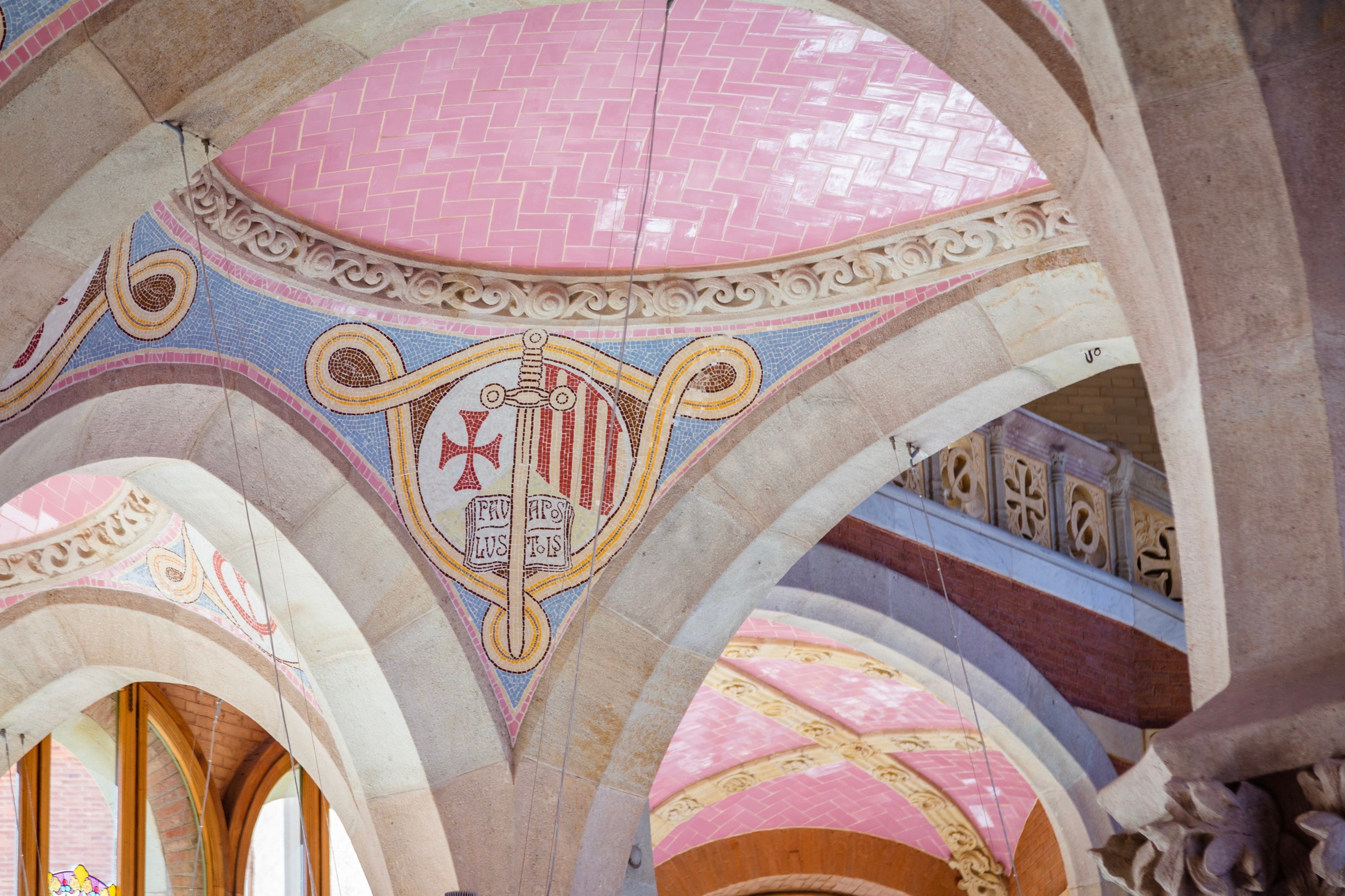 Intricate pink tiled dome roofs at The Hospital de la Santa Creu i Sant Pau, Barcelona.