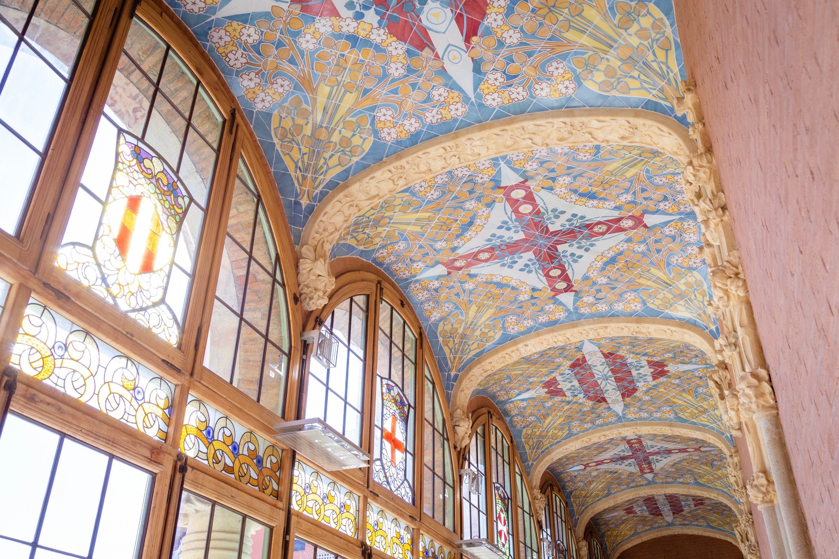 Intricate tiling and plasterwork on a ceiling at The Hospital de la Santa Creu i Sant Pau, Barcelona.
