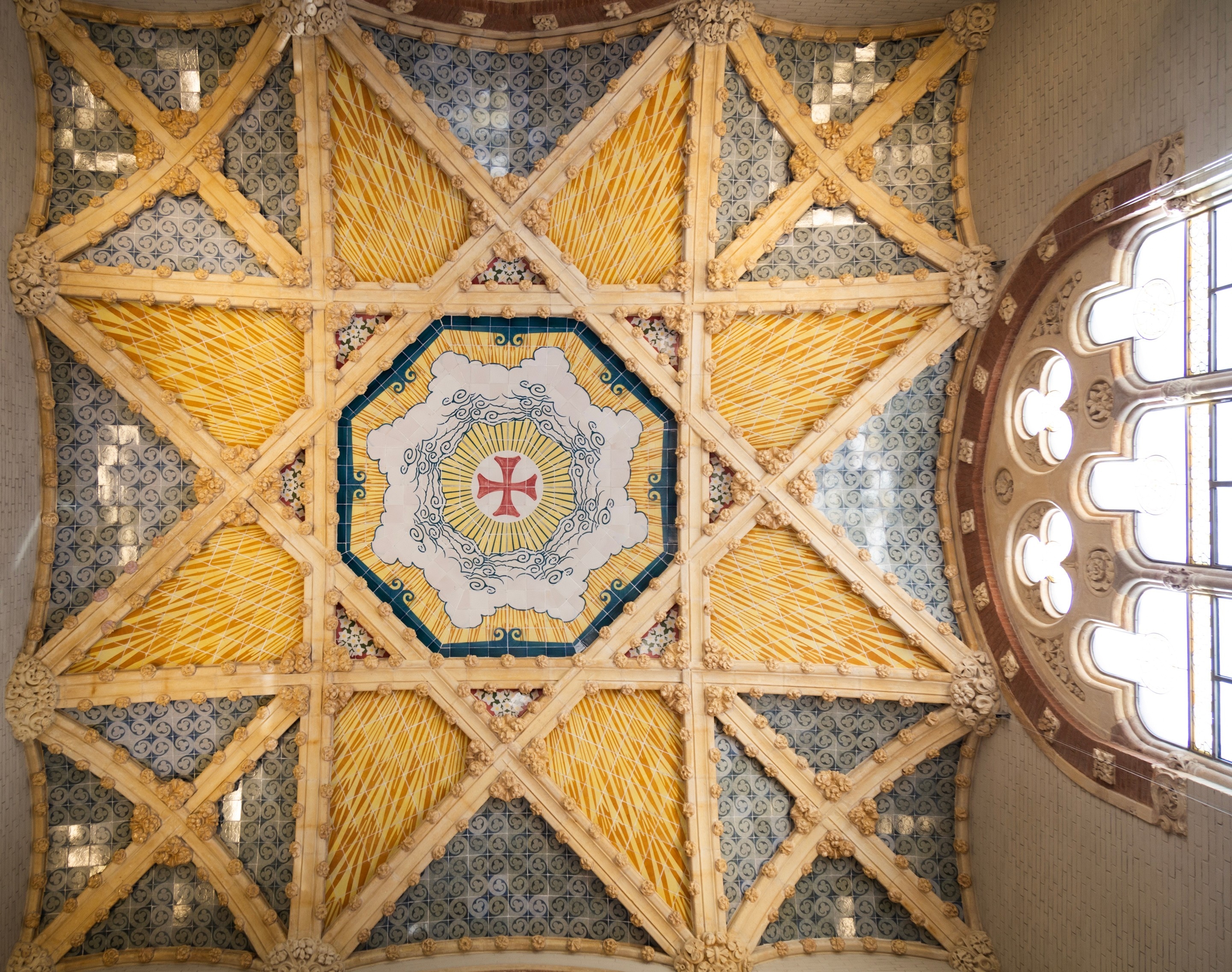 Intricate plasterwork on a ceiling at The Hospital de la Santa Creu i Sant Pau, Barcelona.