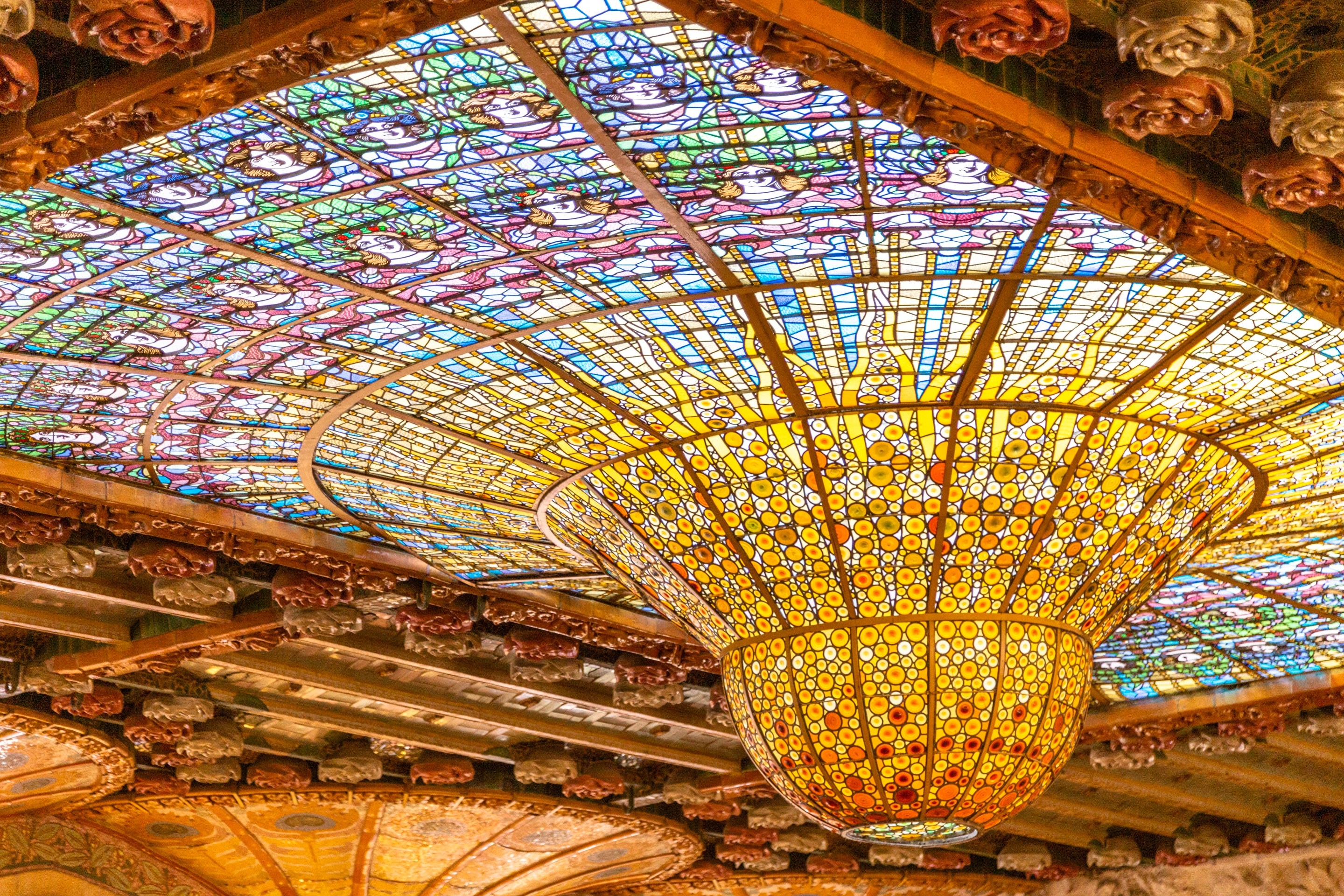 The beautiful stained glass dome at Palau de la Música Catalana, Barcelona.