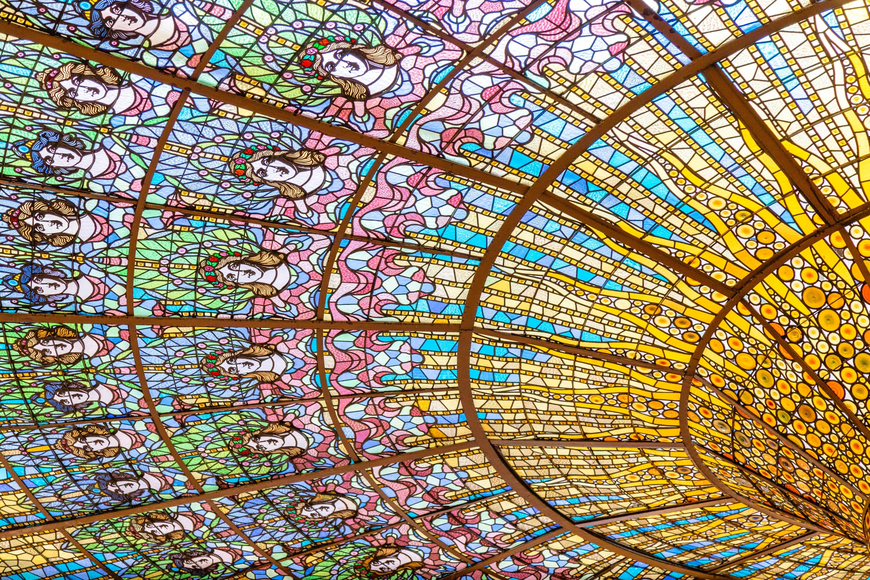 The beautiful stained glass dome at Palau de la Música Catalana, Barcelona.