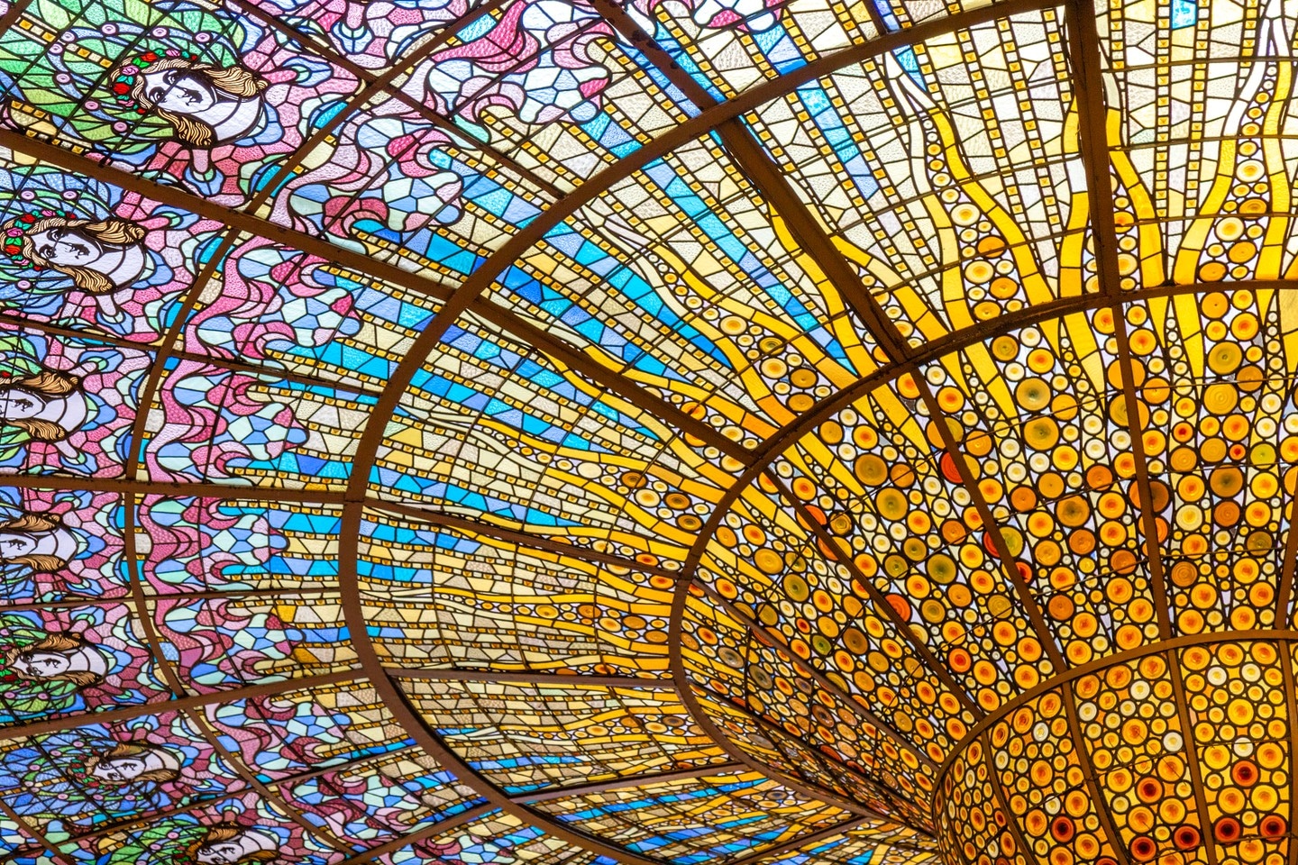 The beautiful stained glass dome at Palau de la Música Catalana, Barcelona.