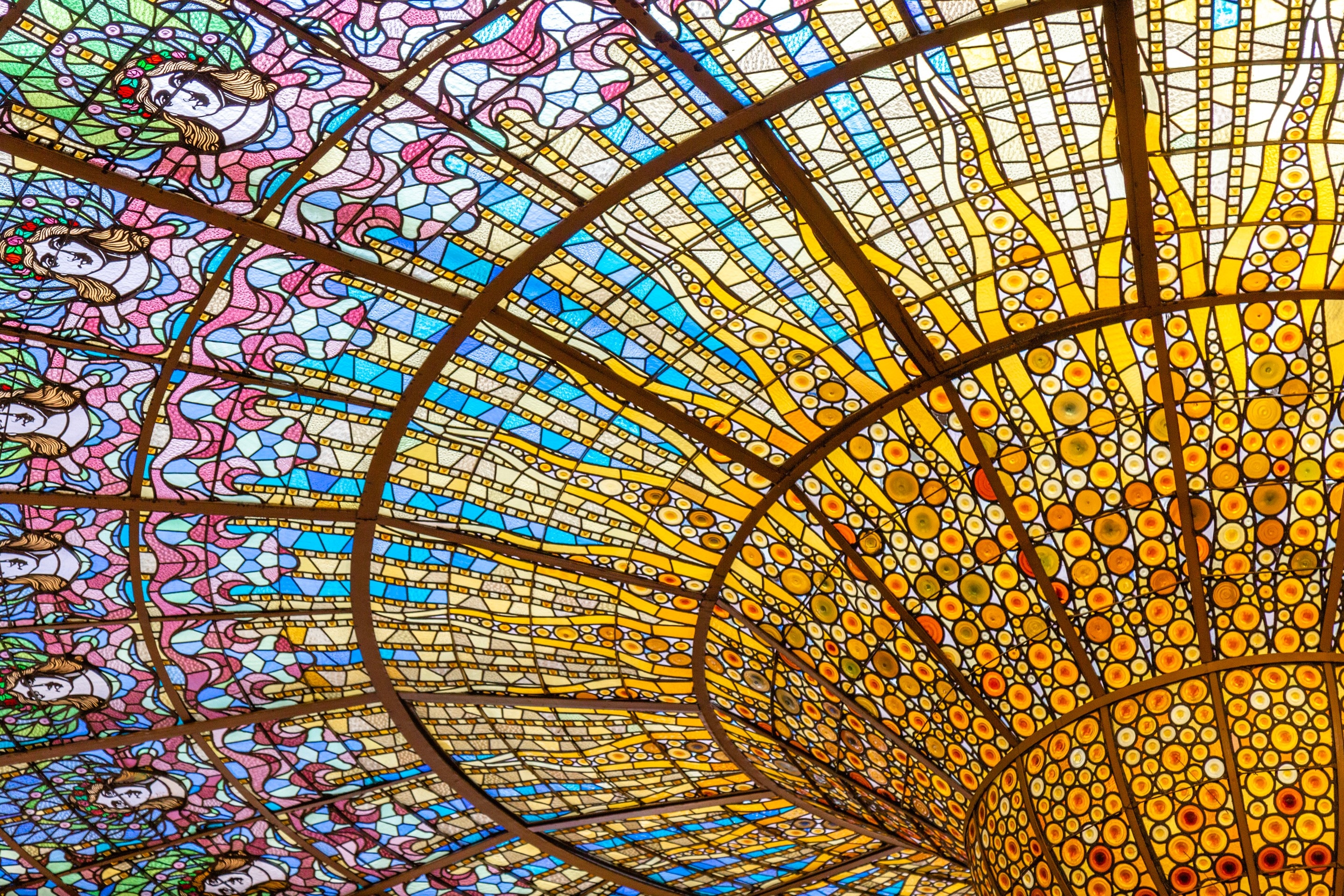 The beautiful stained glass dome at Palau de la Música Catalana, Barcelona.
