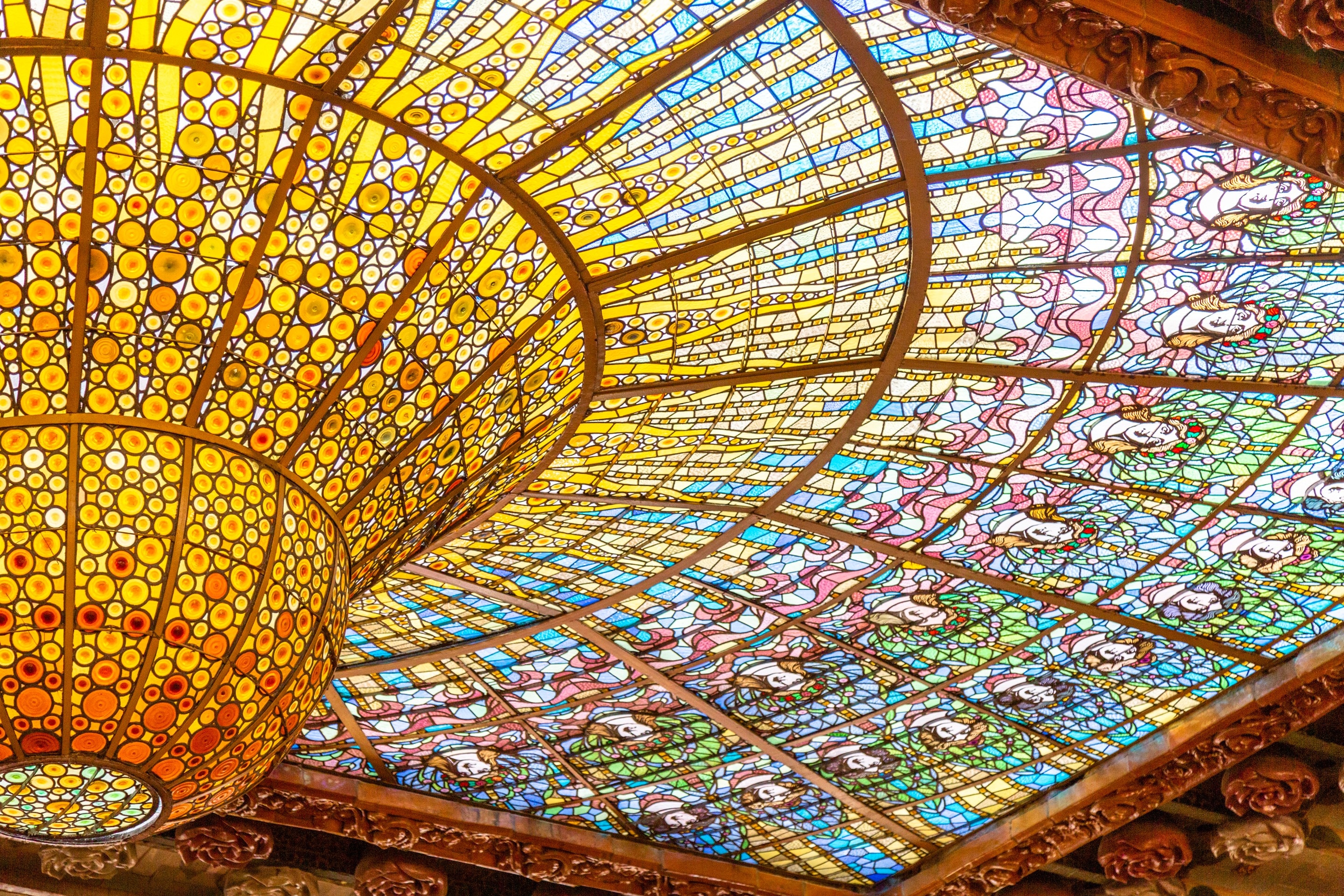 The beautiful stained glass dome at Palau de la Música Catalana, Barcelona.