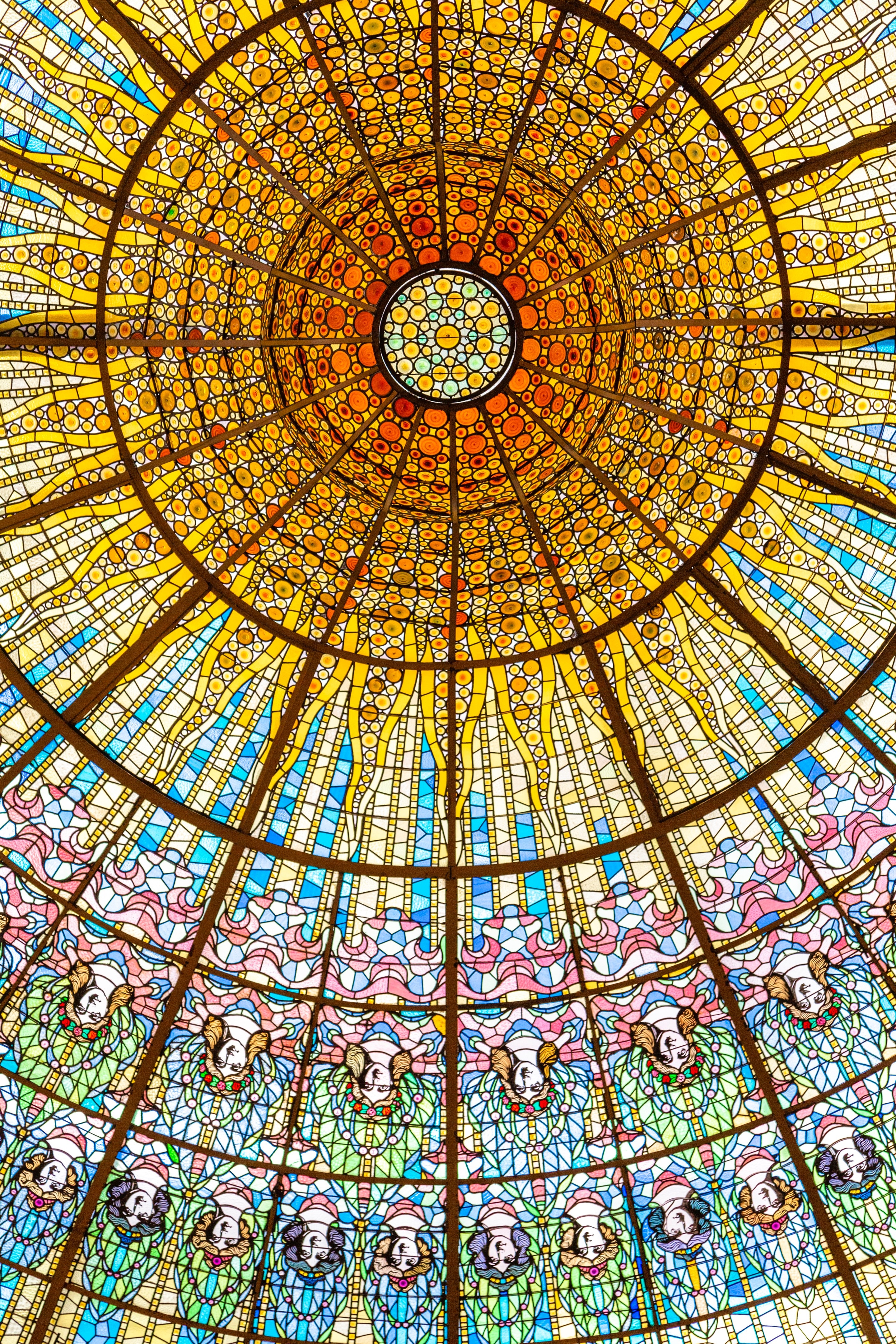 The beautiful stained glass dome at Palau de la Música Catalana, Barcelona.