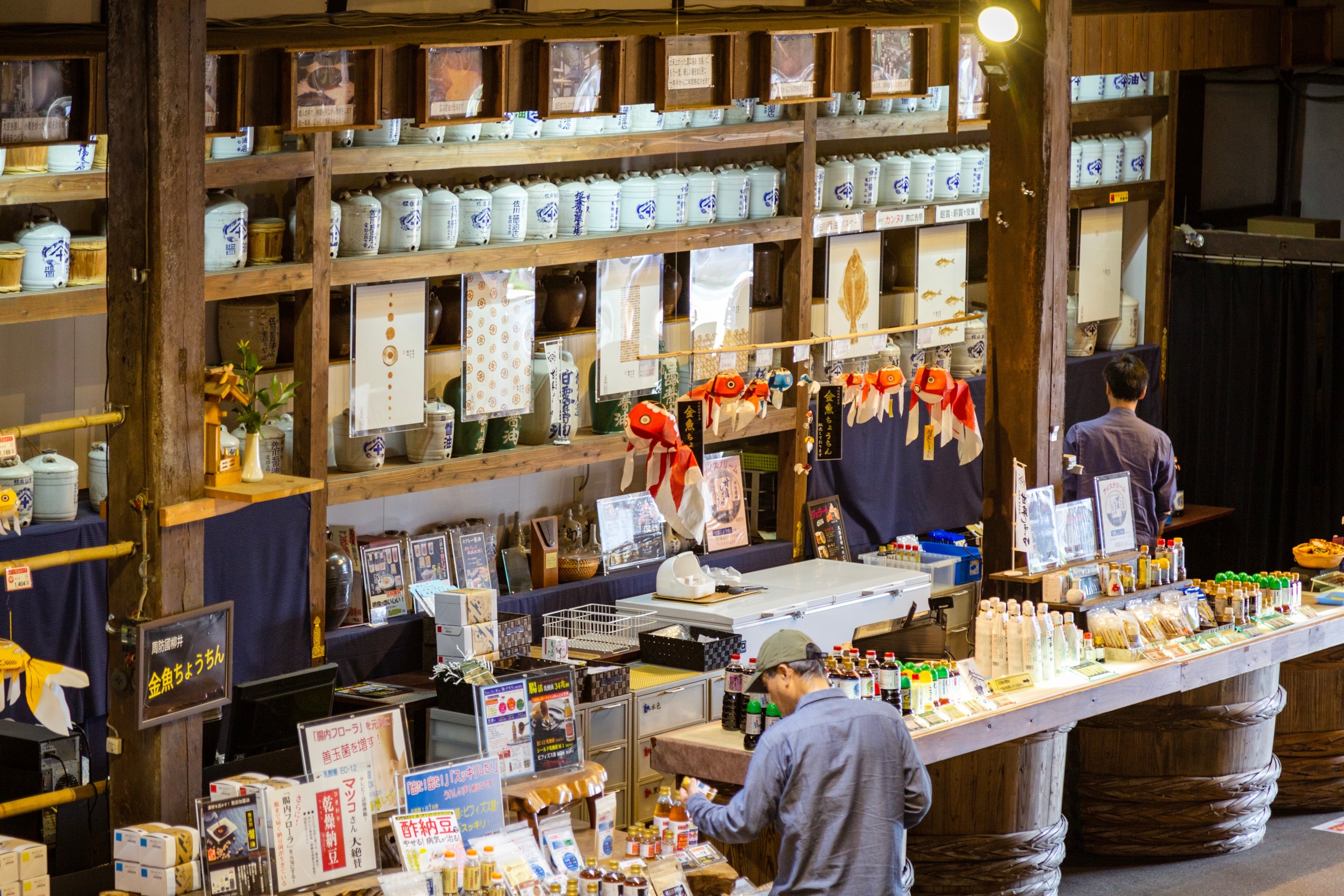 Display counter with many soy sauce related products at the Kanro Joyu Soy Sauce Museum — Yanai, Yamaguchi Prefecture, Japan