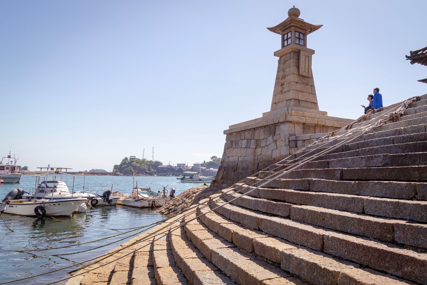 The Joyato Stone Lighthouse above stone steps. Tomonoura Village, Hiroshima Prefecture.