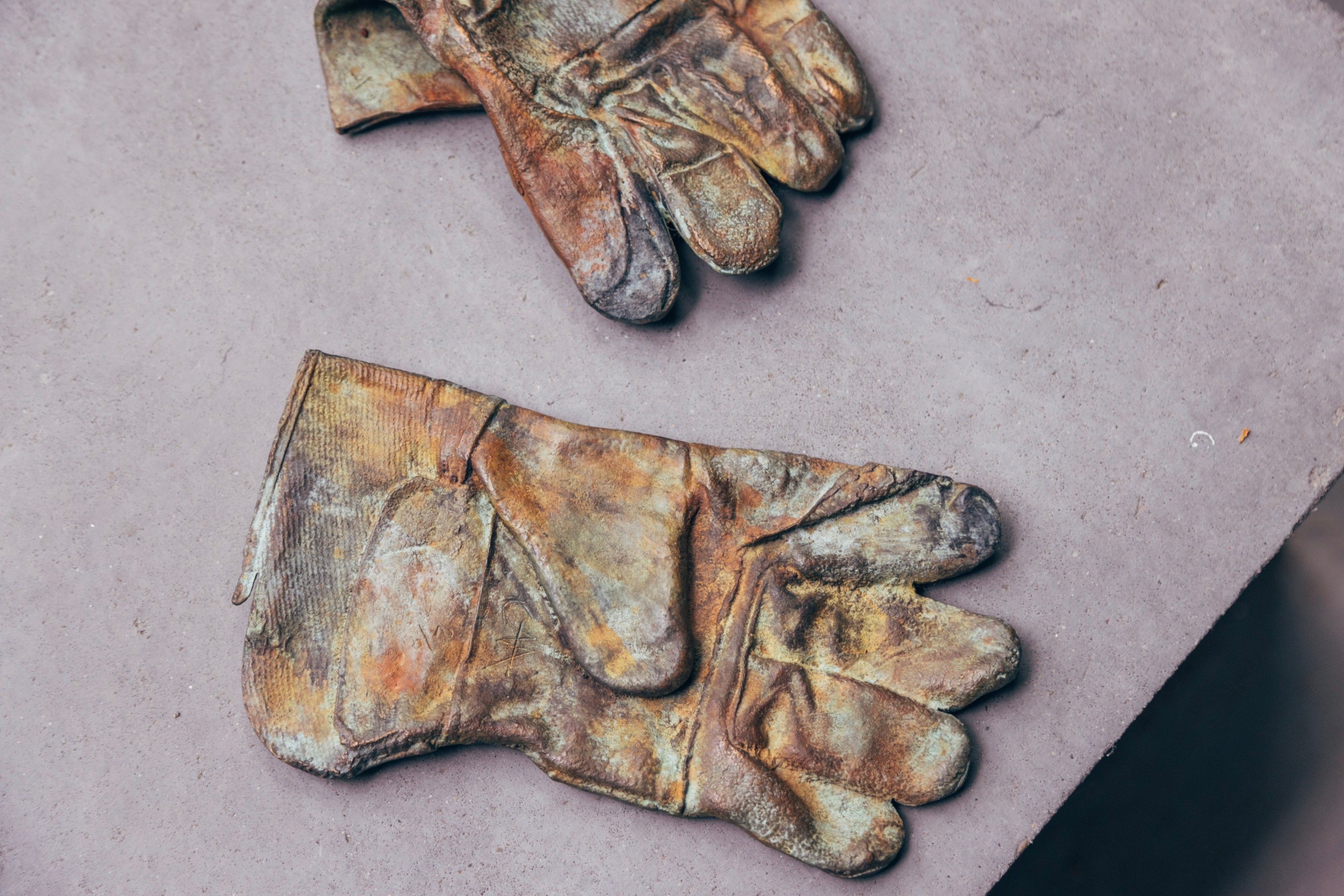 Bronze sculpture of a pair of old workers gloves by Camille Henrot — Middelheim Museum, Antwerp, Belgium