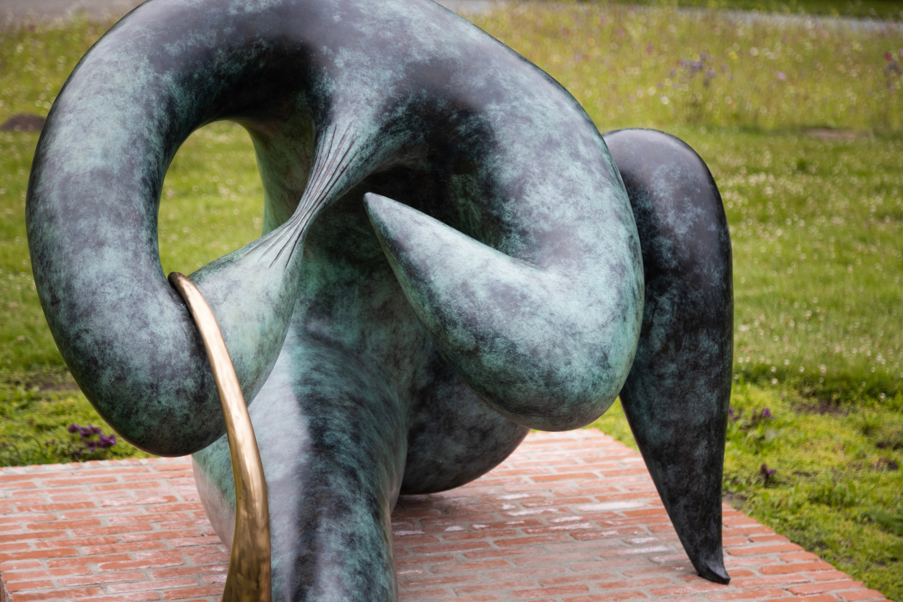 A disturbed humanoid figure scurpture in bronze by Camille Henrot — Middelheim Museum, Antwerp, Belgium