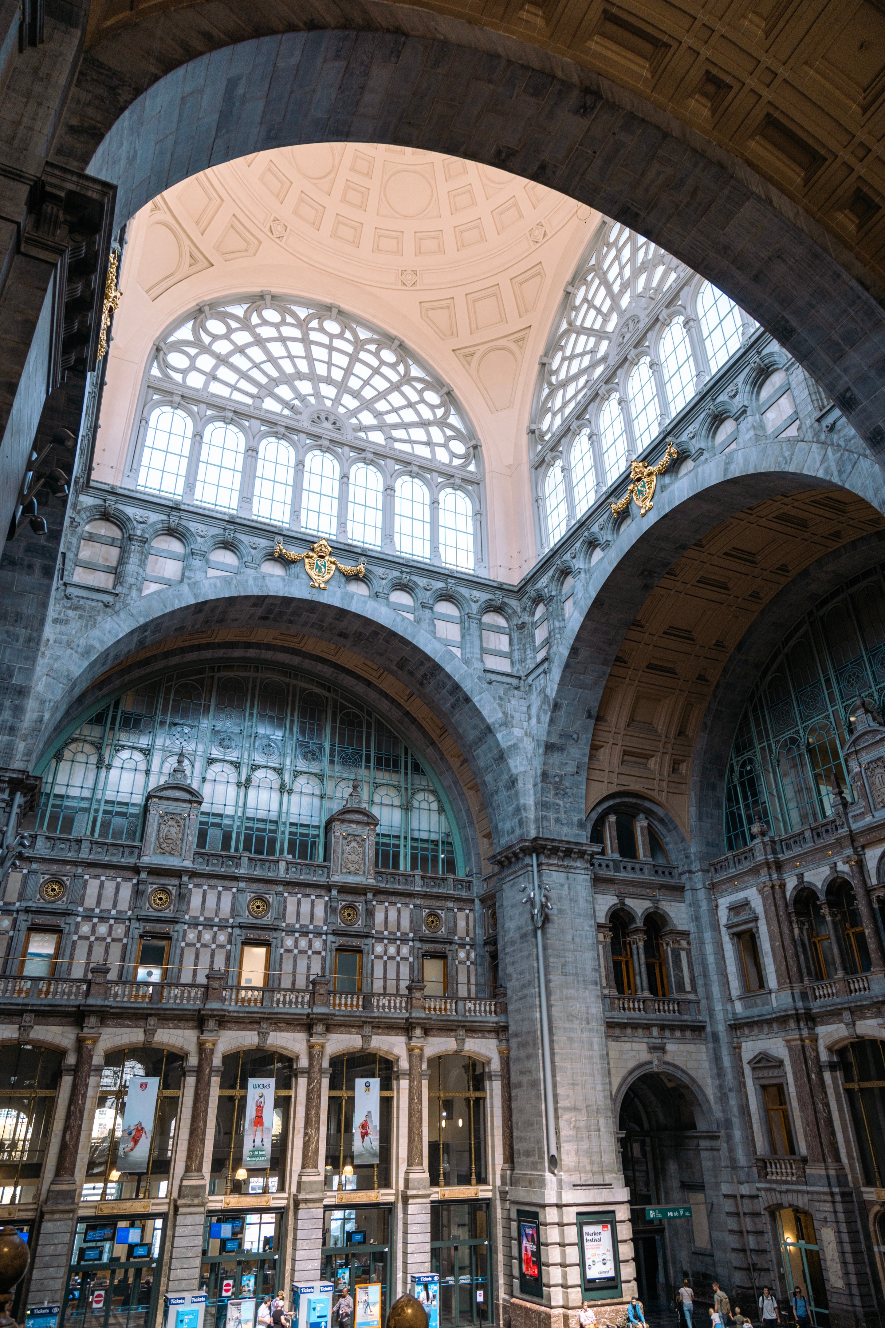 Looking directly up at the impressive iron dome on the Antwerp Cetral Station — Antwerp, Belgium