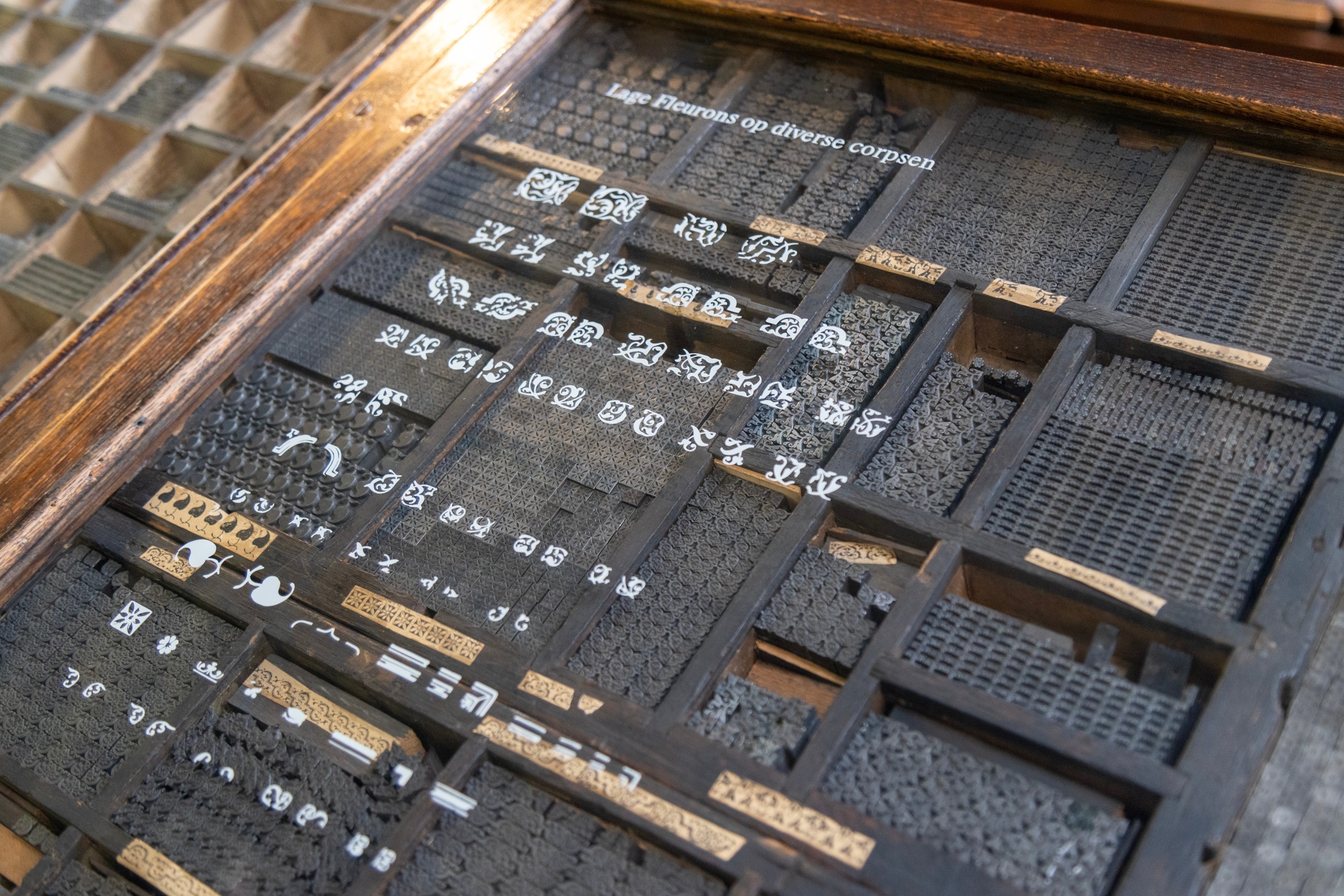 Cases of ornamental moveable type pieces — Museum Plantin-Moretus, Antwerp, Belgium 