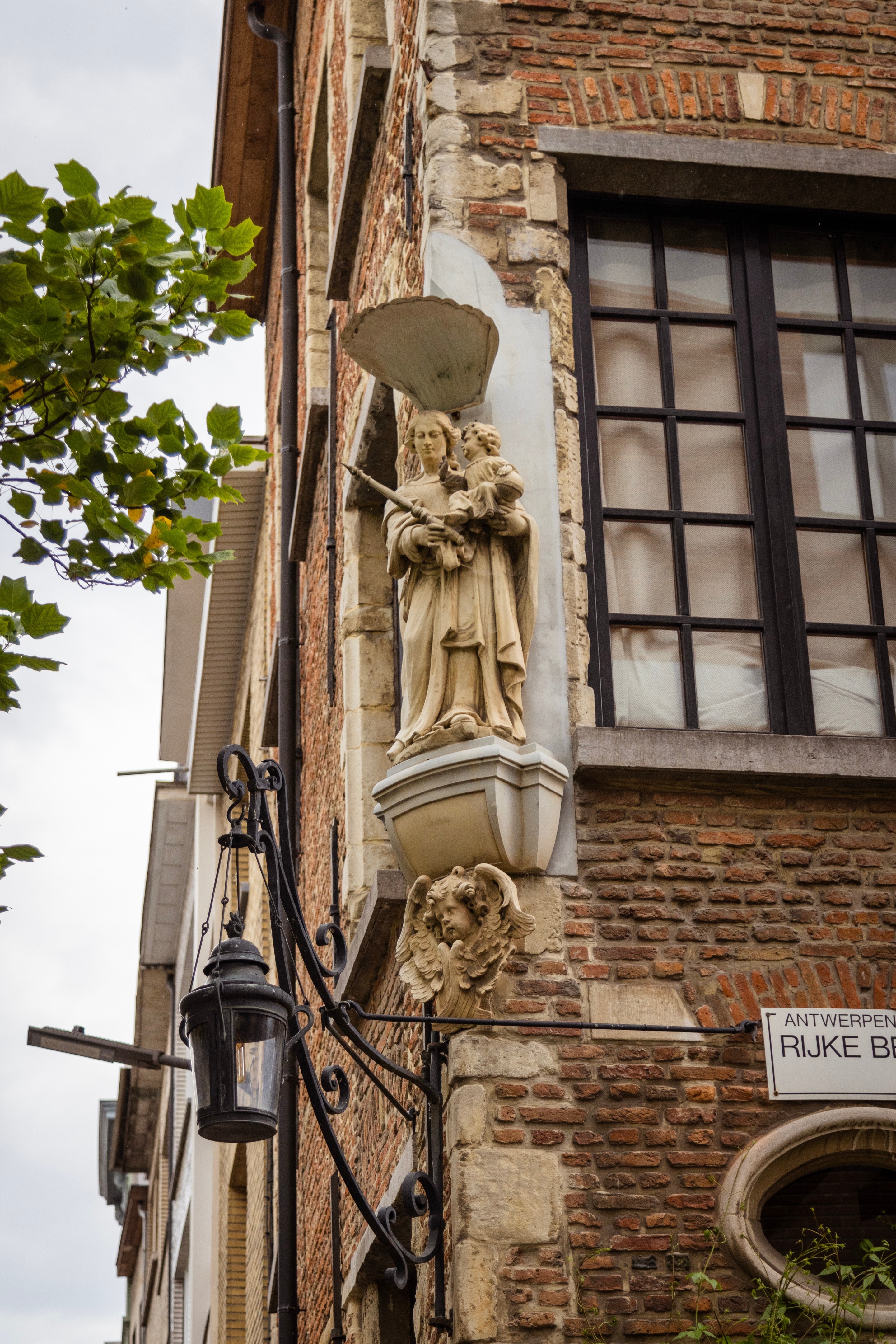 One of the many 'Corner Marys' — statues that decorate the corners of many of the building in and around the centre of Antwerp City, Belgium