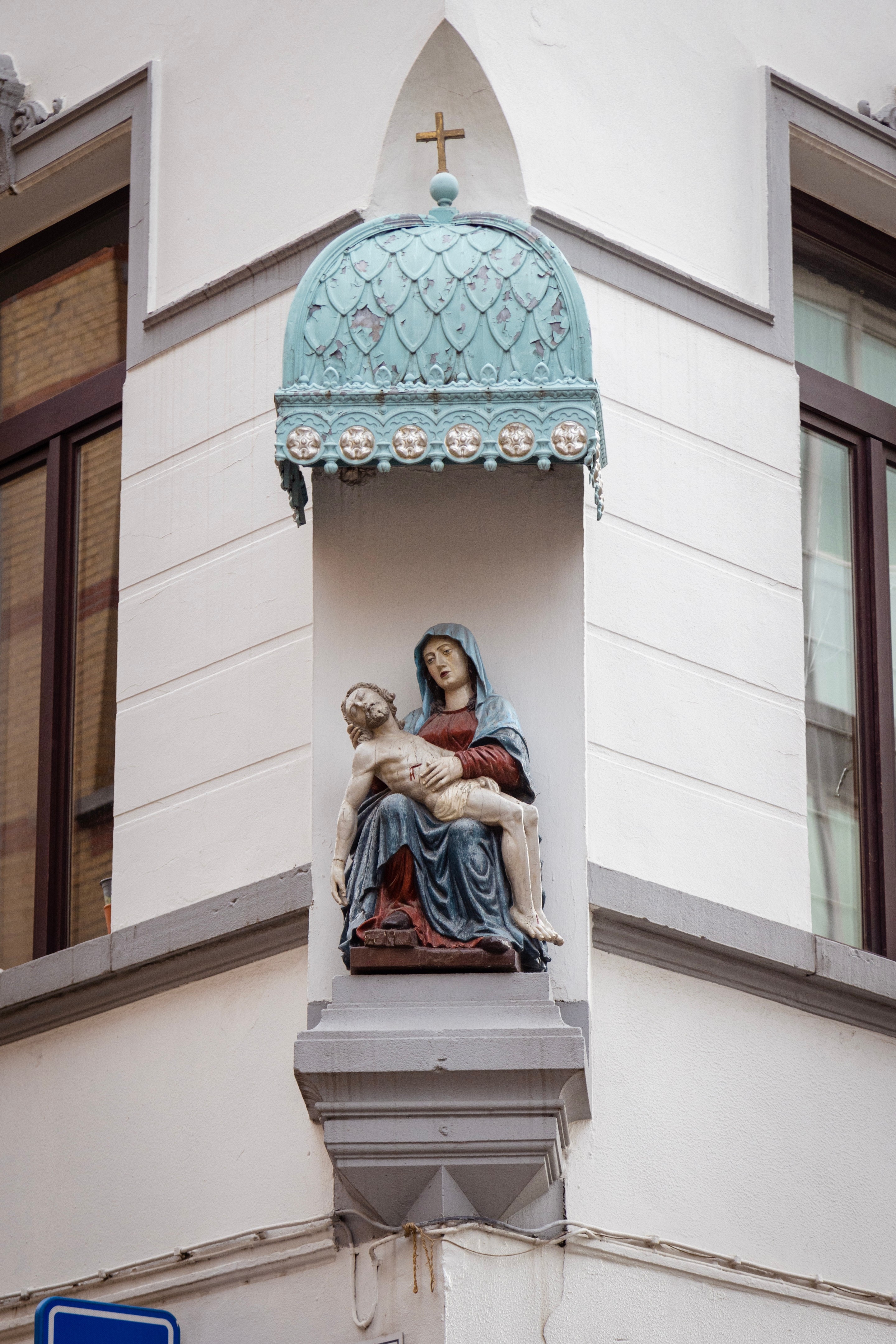 One of the many 'Corner Marys' — statues that decorate the corners of many of the building in and around the centre of Antwerp City, Belgium