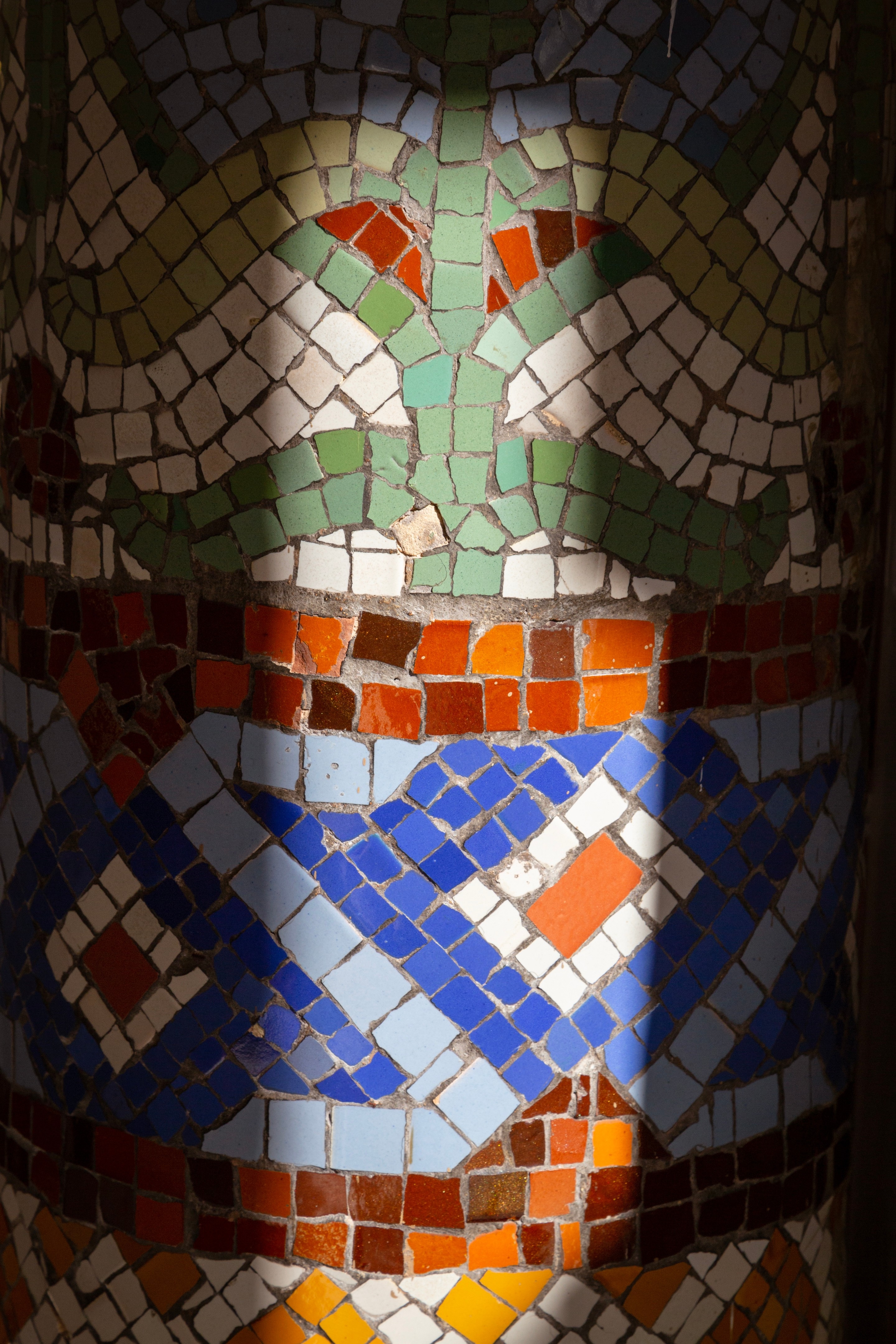Close-up of a tiled mosaic pillar at Palau de la Música Catalana, Barcelona.